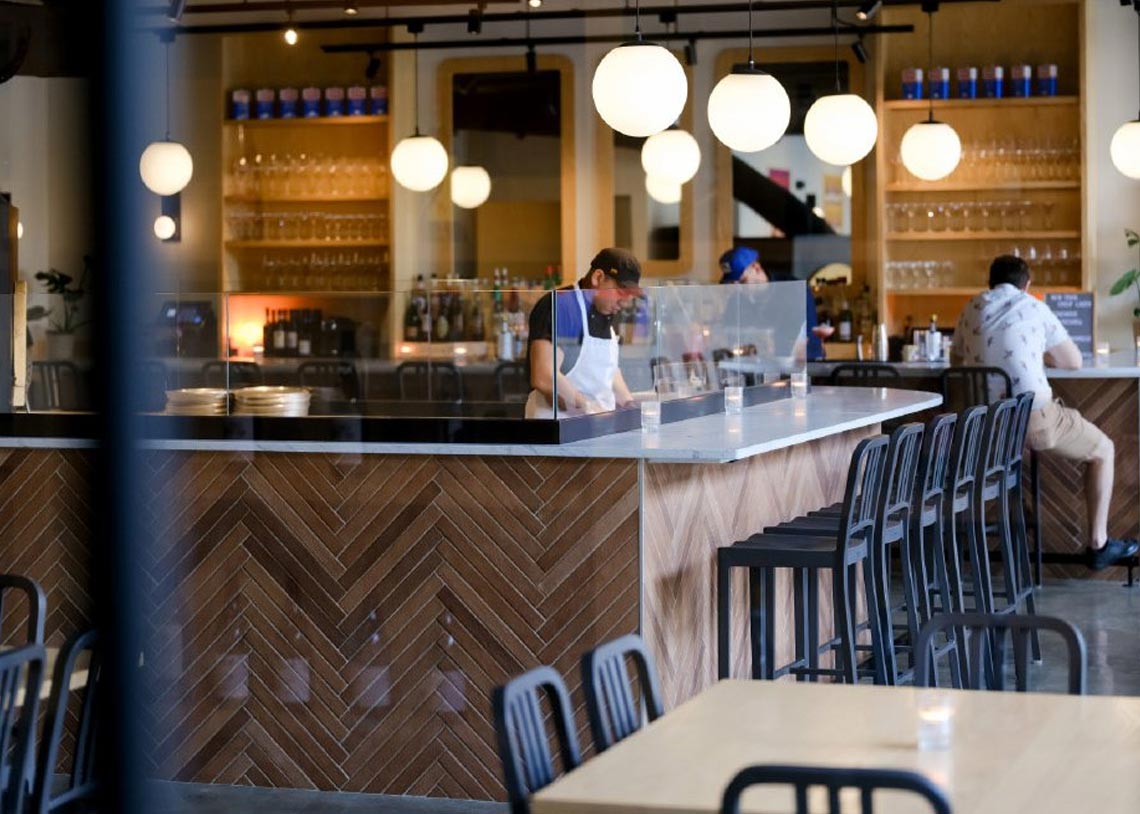 A Bar Torino brunch plate being finished in the kitchen